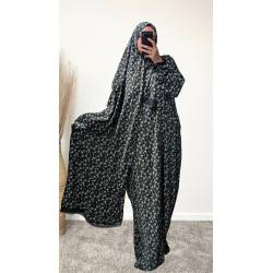 Perfect Gift  One Size Only (52" - 64") fits UK sizes 8 to 24.  62-64”/160cm- Standard Length: The dress is designed to be long enough to cover your feet while praying Salah. If you would like to adjust the length, please click on the 'Tailored Length' option and specify your preferred length in the 'Order Notes' section at checkout, or email us, and we will confirm the change via email. You can refer to the size chart below to help you determine the suitable length  83cm - Width of dress : This refers to one side of the dress when laid flat, making the full circumference approximately 166cm. The dress is intentionally designed to be wide and oversized for a modest, full-coverage fit.  75cm - Sleeve length (from wrist to shoulder) Hijab Measurements: 210 cm (Length) x 60 cm (Width) Optional: You can choose to have the hijab attached or separate from the abaya Attached Hijab: The hijab will be attached with the short side on the right allowing the long side to be wrapped with your left hand.  If you prefer a right - handed wrapping arrangement, please add a note in the 'Order notes' section at checkout, or email us, and we will confirm the change via email. You must notify me within 24 hours before I proceed with sewing the custom attachment. Invisible side pockets Elastic cuff finished  Lace finish on the cuff and hijab   Material - Polyester, Crepe  Colour - Black