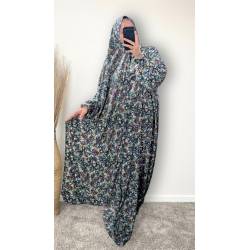 Perfect Gift  One Size Only (52" - 64") fits UK sizes 8 to 24.  62-64”/160cm- Standard Length: The dress is designed to be long enough to cover your feet while praying Salah. If you would like to adjust the length, please click on the 'Tailored Length' option and specify your preferred length in the 'Order Notes' section at checkout, or email us, and we will confirm the change via email. You can refer to the size chart below to help you determine the suitable length  83cm - Width of dress : This refers to one side of the dress when laid flat, making the full circumference approximately 166cm. The dress is intentionally designed to be wide and oversized for a modest, full-coverage fit.  75cm - Sleeve length (from wrist to shoulder) Hijab Measurements: 210 cm (Length) x 60 cm (Width) Optional: You can choose to have the hijab attached or separate from the abaya Attached Hijab: The hijab will be attached with the short side on the right allowing the long side to be wrapped with your left hand.&nbsp; If you prefer a right - handed wrapping arrangement, please add a note in the 'Order notes' section at checkout, or email us, and we will confirm the change via email. You must notify me within 24 hours before I proceed with sewing the custom attachment. Invisible side pockets Shirred cuff finished - Elasticated, gathered cuff with stitched rows that create a soft ruffle at the wrist.&nbsp; Material - Polyester&nbsp; Colour - Purple, Black, Green, Orange & Blue  &nbsp;