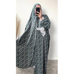 Perfect Gift  One Size Only (52" - 64") fits UK sizes 8 to 24.  62-64”/160cm- Standard Length: The dress is designed to be long enough to cover your feet while praying Salah. If you would like to adjust the length, please click on the 'Tailored Length' option and specify your preferred length in the 'Order Notes' section at checkout, or email us, and we will confirm the change via email. You can refer to the size chart below to help you determine the suitable length  83cm - Width of dress : This refers to one side of the dress when laid flat, making the full circumference approximately 166cm. The dress is intentionally designed to be wide and oversized for a modest, full-coverage fit.  75cm - Sleeve length (from wrist to shoulder) Hijab Measurements: 210 cm (Length) x 60 cm (Width) Optional: You can choose to have the hijab attached or separate from the abaya Attached Hijab: The hijab will be attached with the short side on the right allowing the long side to be wrapped with your left hand.  If you prefer a right - handed wrapping arrangement, please add a note in the 'Order notes' section at checkout, or email us, and we will confirm the change via email. You must notify me within 24 hours before I proceed with sewing the custom attachment. Invisible side pockets Elastic cuff finished  Lace finish on the cuff and Hijab    Material - Polyester, Crepe  Colour - Bottle green