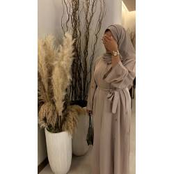 Perfect Gift Premium quality abaya, including 2 pockets  Colour Nude Available in sizes (length) 52 (8-10) 54 (10-12) 56 (12-14) 58 (14-16) 60 (16-18)  Can be shortened at no extra cost, please leave a message at checkout. Gift packing available, please see separate listing.