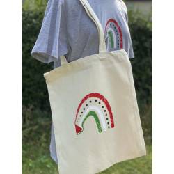 Perfect Gift Introducing the Tasnim Rainbow Organic Tote Bag, featuring a vibrant watermelon rainbow design symbolising Palestine. Crafted from 100% organic cotton, this tote bag not only offers quality but also supports a great cause. Elevate your style while making a positive impact - get your Tasnim Rainbow Organic Tote Bag today! N.B: As all apparel is printed in-house please allow up to 2 weeks for delivery. Should you need the items sooner, please contact us and we do our best to help you Insha Allah.