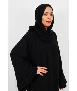Perfect Gift Black Nida AbayaFabric Korean Nidafine DMC work around sleeves and necklinebutton closure for versatility. Exude grace and sophistication with this Black Nida Abaya, crafted with delicate DMC stonework along the sleeves and neckline for a subtle yet elegant sparkle. Made from premium Nida fabric, it drapes beautifully while ensuring comfort and breathability. Designed for versatility, this abaya can be worn open or closed with its button closure, making it a perfect addition to your modest fashion wardrobe for both casual and formal occasions.